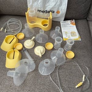 Medela pump accessories. Never been used. Except two left tubes were used.